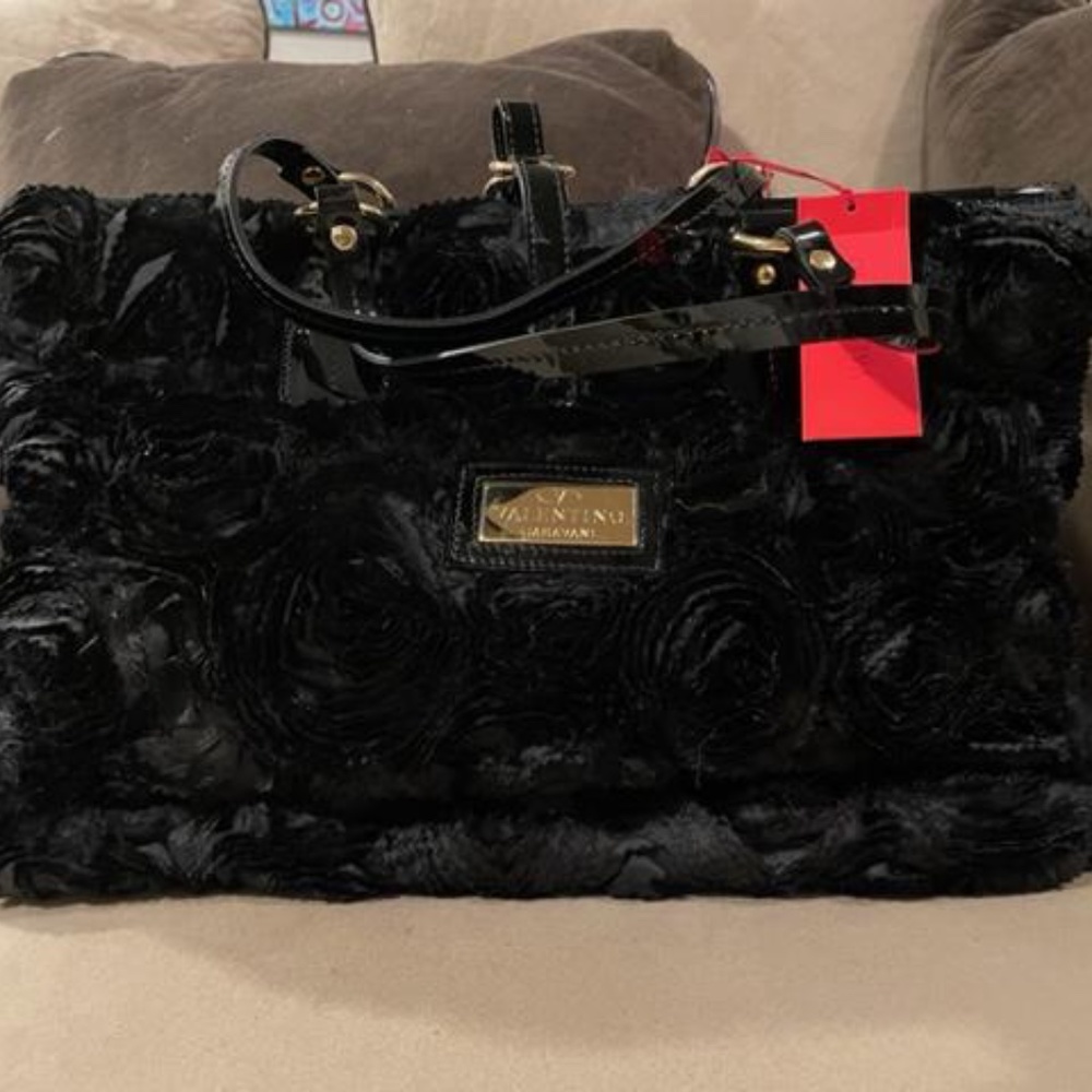 New with tags Valentino black "Rosette" handbag